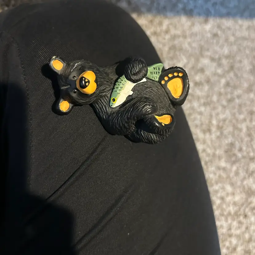 Bear Holding A Fish