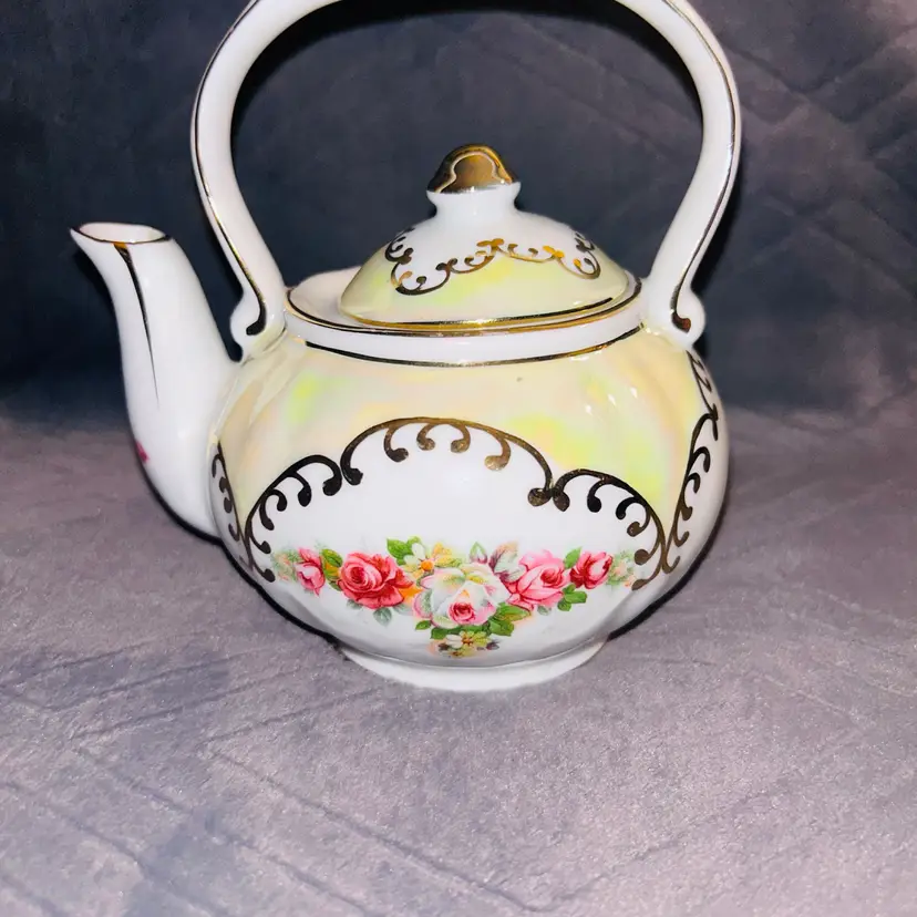 Mini Porcelain Lustre Ware Tea Pot With Floral Design And Gold Accents