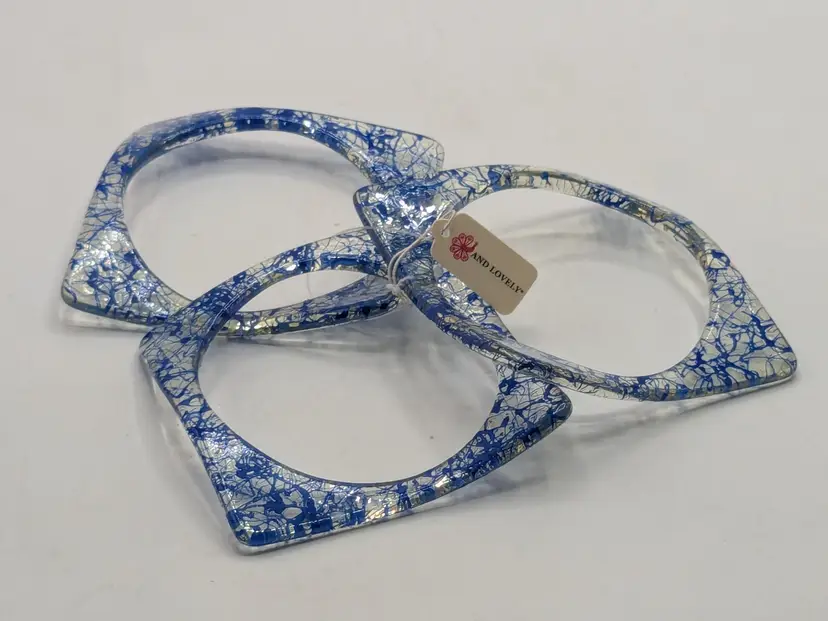 And Lovely Acrylic Blue and Clear Bangle Set NWT