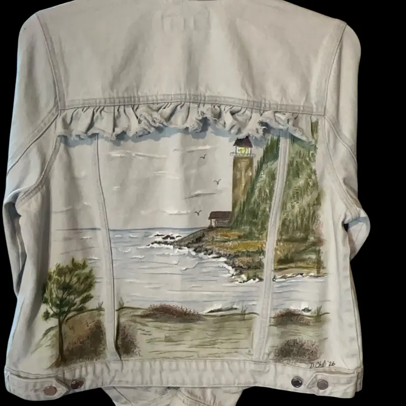 Watercolor Original Denim Jacket With Window Pane Effect Looking Out At The Lighthouse Standing Guard On The Cove