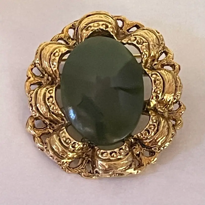 #28 - Goldtone Jade 1.5” Brooch