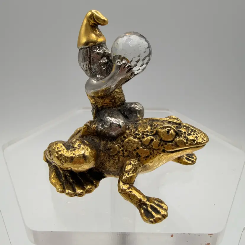 Gnome With A Crystal Riding A Brass Frog