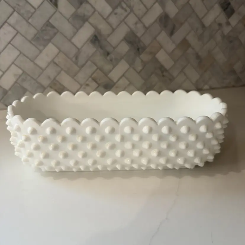 Fenton white milk glass hobnail oblong planter with scalloped rim.