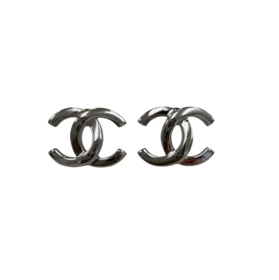 Chanel Silver Tone Twisted CC Earrings