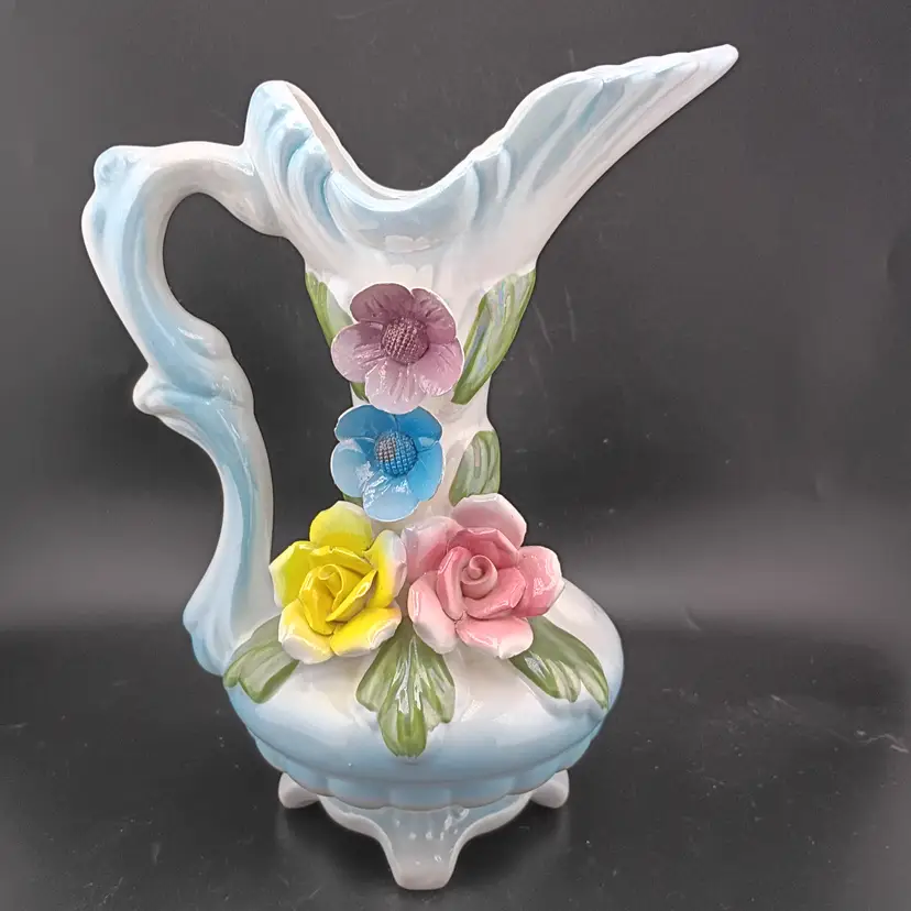 Porcelain pitcher with flowers