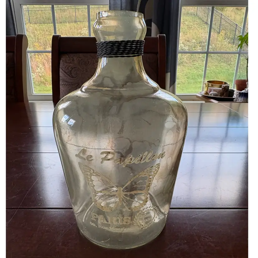 Decorative Glass Bottle Vase featuring a "Le Papillon" butterfly and vintage Paris typography decal.