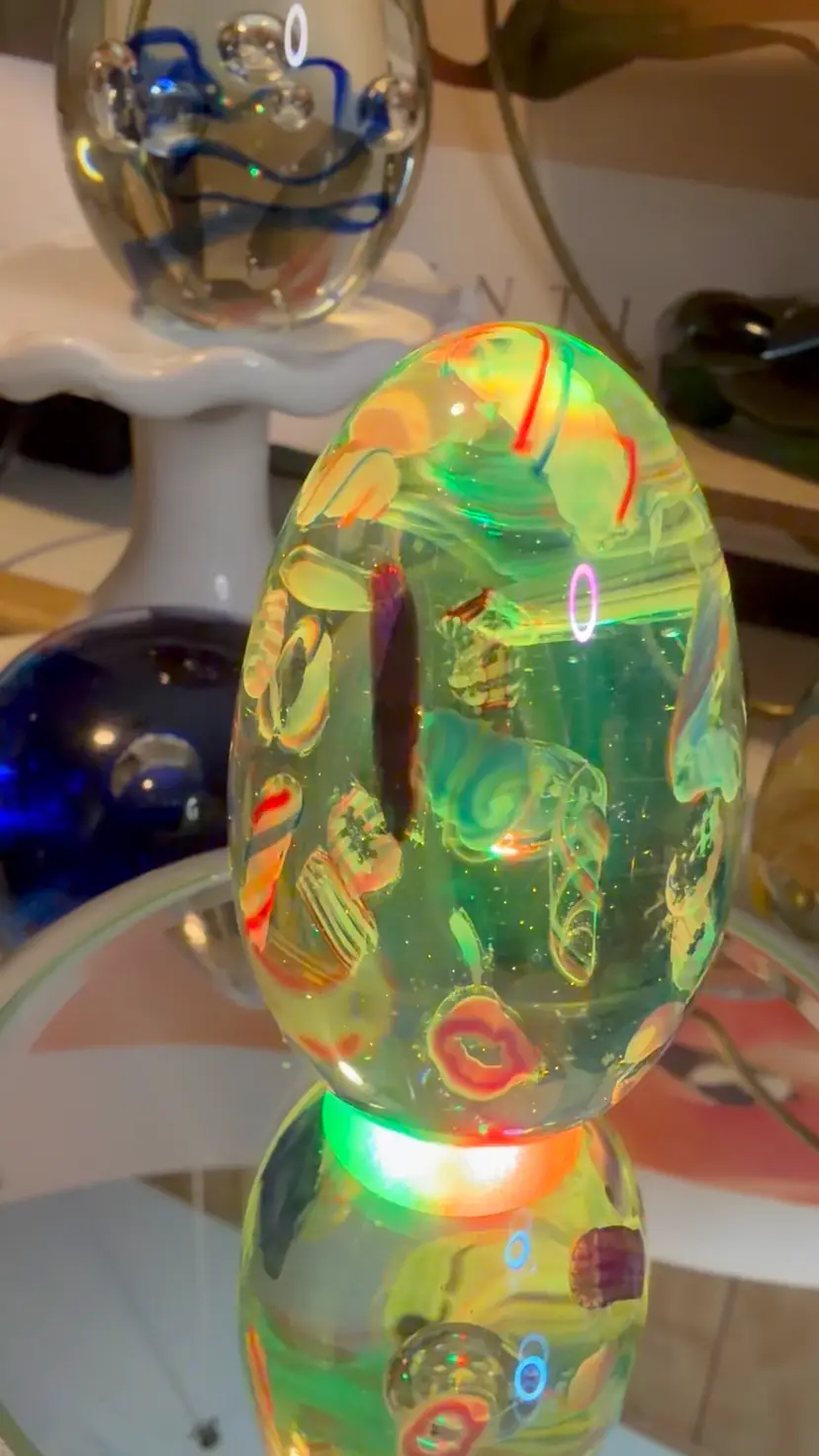 #25…..Confetti in Glass, art glass egg paperweight with colorful inclusions and bubbles