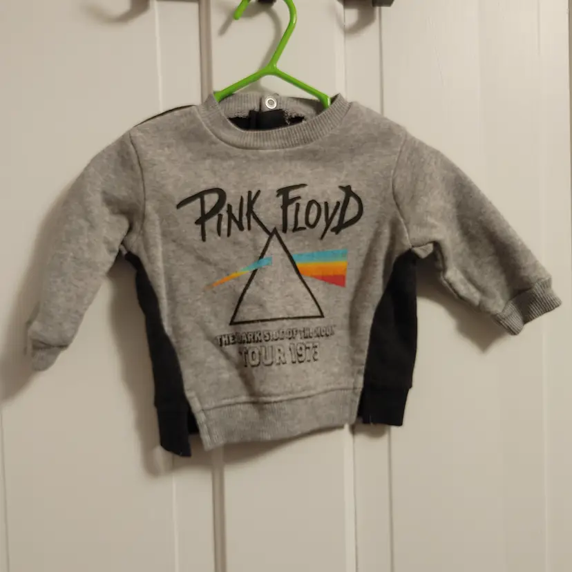 Kids- Brand: Pink Floyd. Size 3-6 Months. 2021. Pink Floyd tee. Material- 60% cotton, 40% polyester. No callouts.