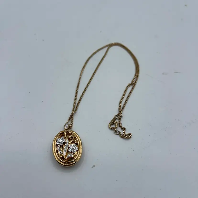Gold Tone Oval Locket Necklace Filigree Floral Rhinestone Cover