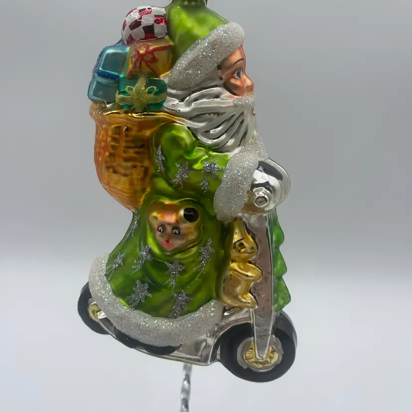 12-Christopher Radko Santa On Scooter, Green Jacket 6 Inches Presents
