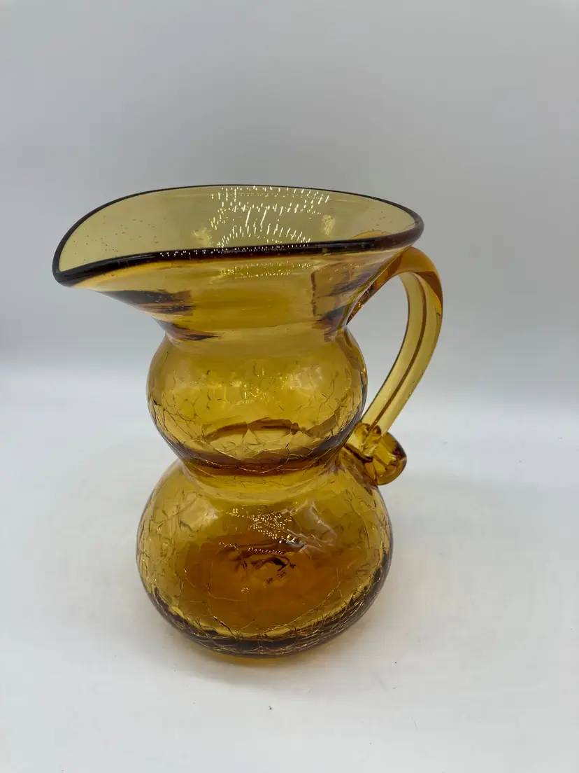 Vintage hand-blown amber crackle glass double-bulb pitcher