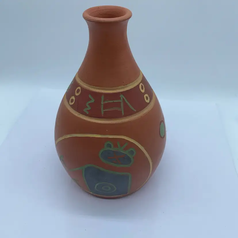 #3012 A hand-painted and incised Peruvian terra cotta folk art vase.