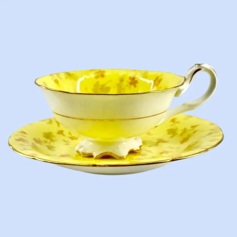 #660E- Vintage Footed Cappuccino Tea Cup & Saucer Signed Matched Numbered Set #5603 Bone China Cauldron Ware   Brown,Westhead, Moore & Co Potters To Her Majesty 
Coffee Yellow w/ Flowers and Gold Trim