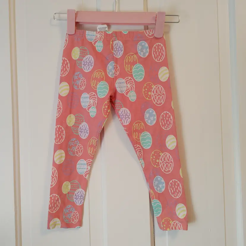Kids- Brand: Unknown. Size 3T. Pink egg leggings. Material- 95% cotton, 5% spandex. No call outs.