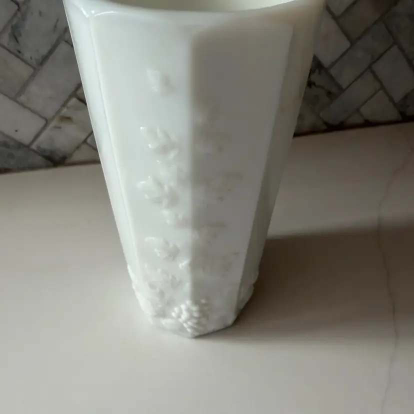 A vintage Westmoreland paneled milk glass grape tumbler.