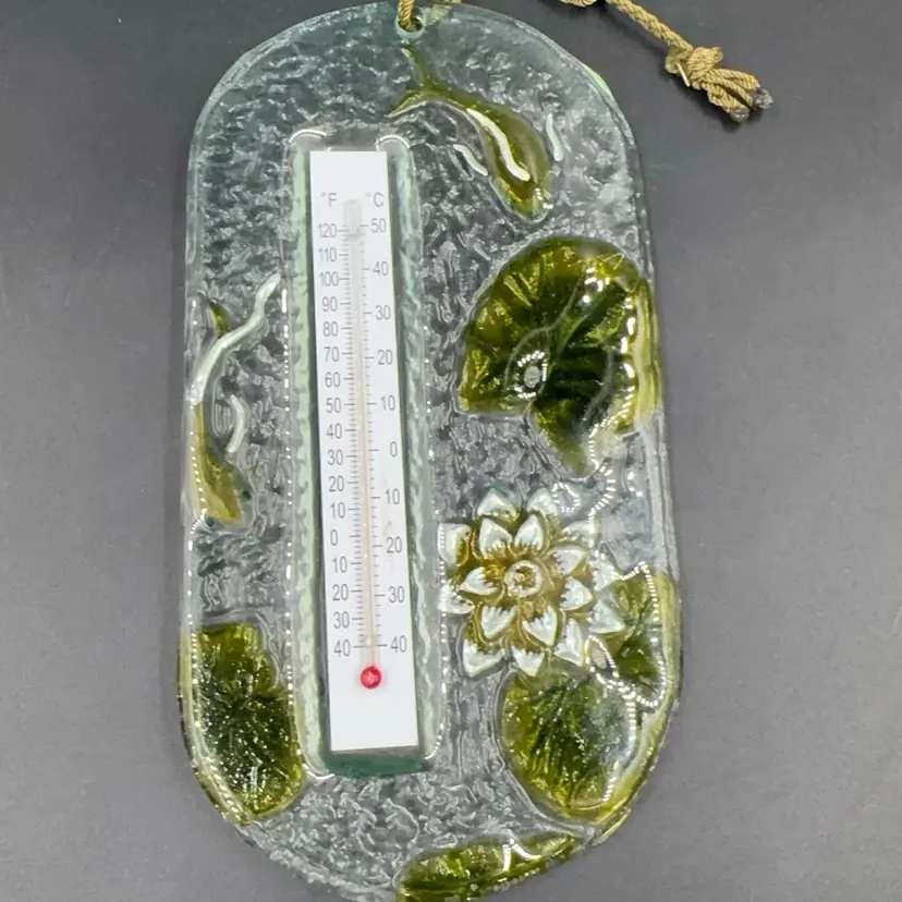 Contemporary Slab Glass With Koi Fish And Lilly Pad Designed An Oval Shape With A Weather Thermometer