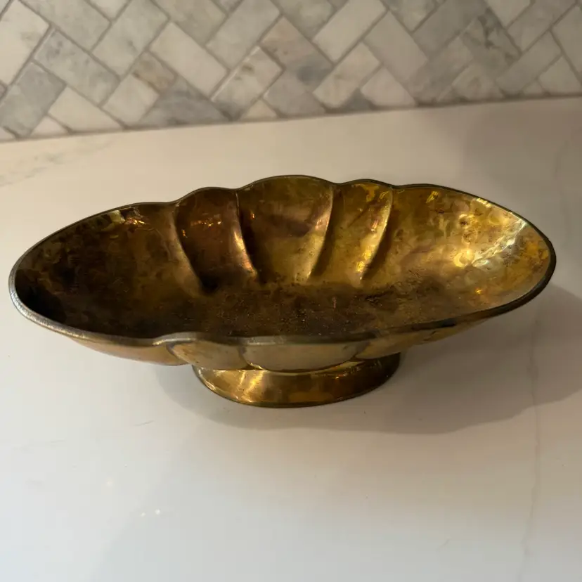 Vintage oval brass pedestal compote bowl.