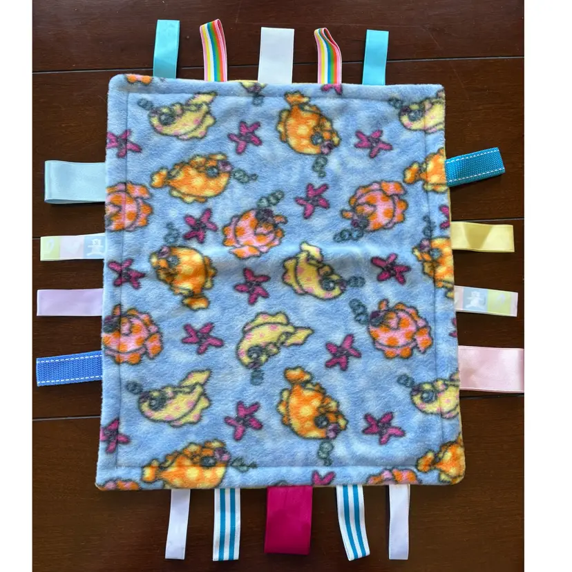 Handmade Sensory Baby/Toddler Snuggle Blanket. Fleece Body With Various Ribbons And Webbing Loops For Texture. 15”x13”