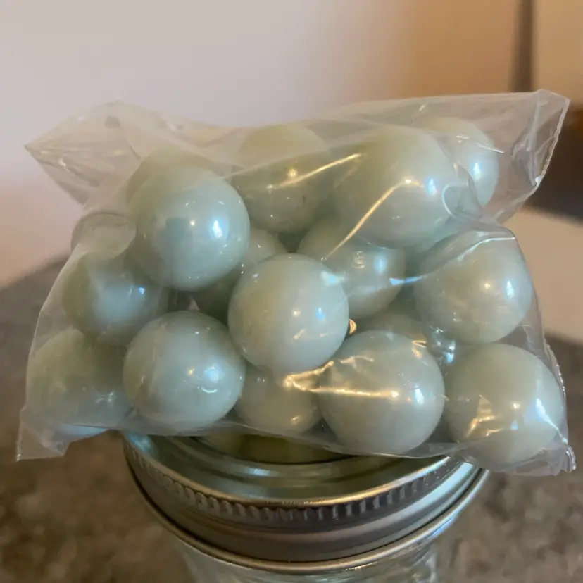 22 Very Lt. Blue Glass Marbles