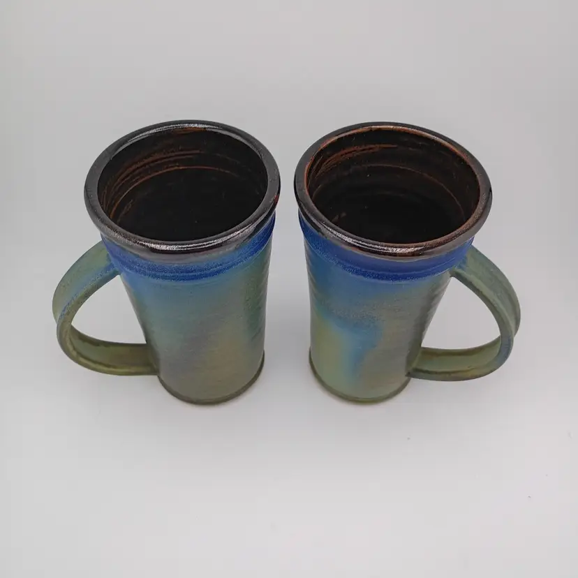 Pair of studio pottery mugs, signed Wayne Smith