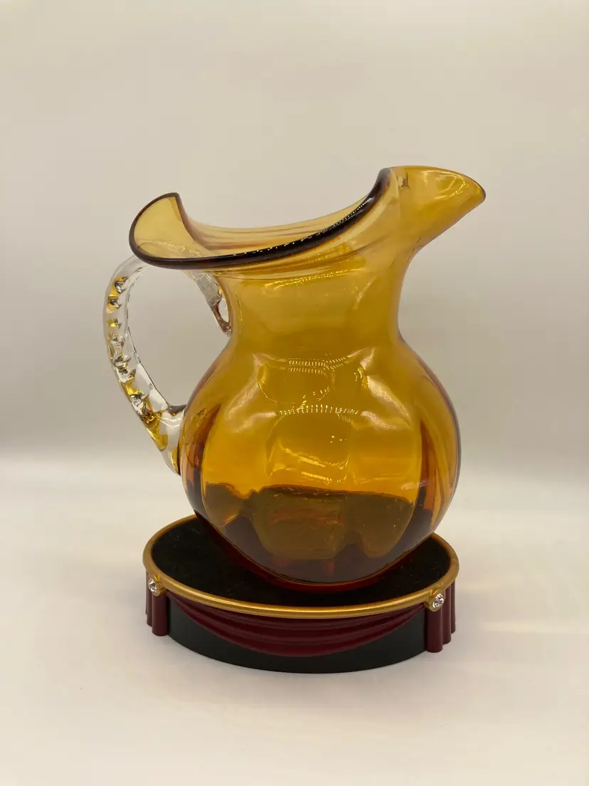 Flared Top, Amber Glass Pitcher with Twisted Clear Handle