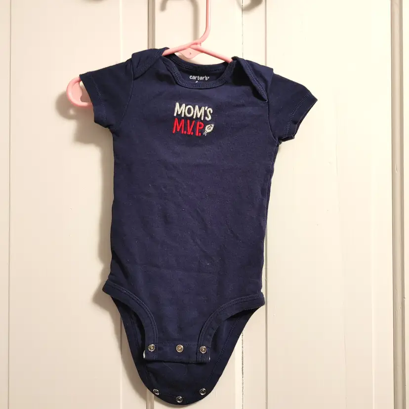 Kids- Brand: Carters. Size 6 Months. MVP onesie. Material- 100% cotton. No callouts.
