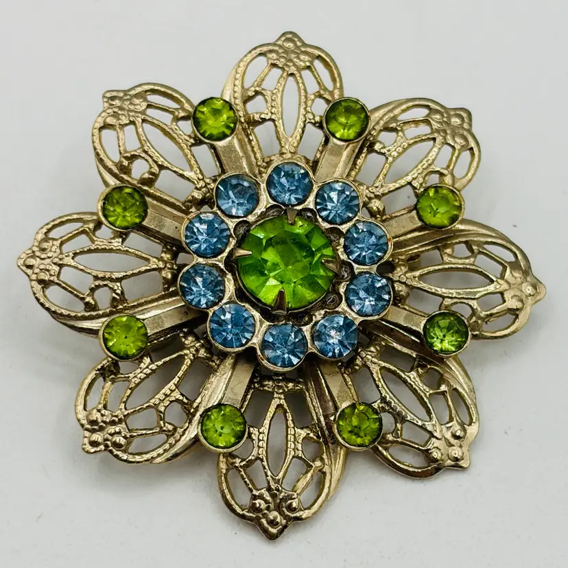 Vintage Flower Brooch Gold Tone w/ two tone Blue & Green Rhinestones