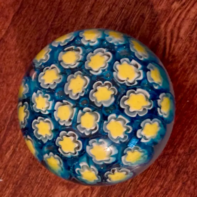 Vintage Millefiori art glass paperweight featuring a dome of blue and yellow flower-like glass canes 1.75”