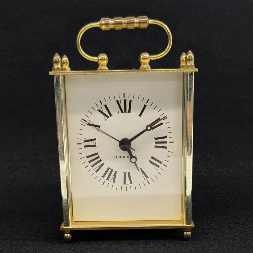 Vintage Brass Quartz Carriage Clock with a Gold Tone Finish & Portable Handle