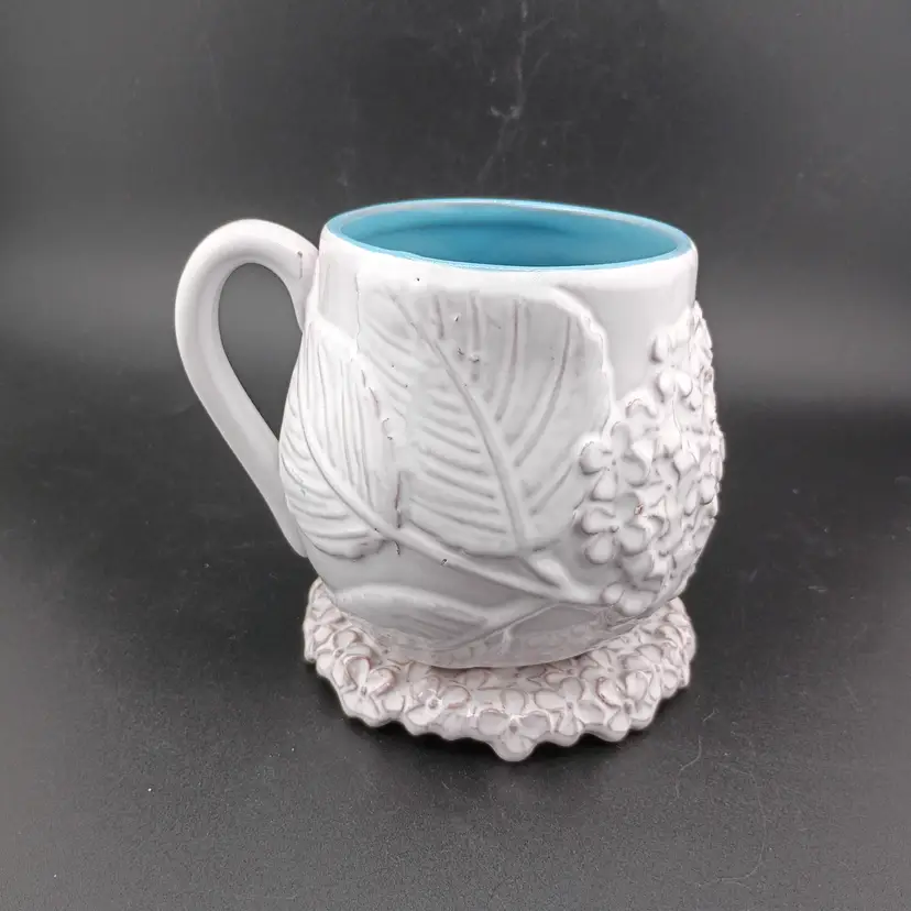 Mud Pie lidded mug with floral design