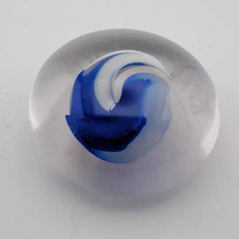 Signed blue and white paperweight