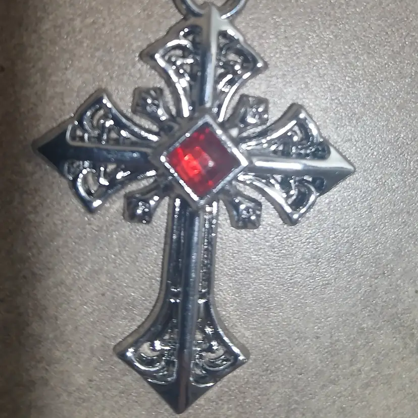 Cross with red gemstone to keep the vampires away