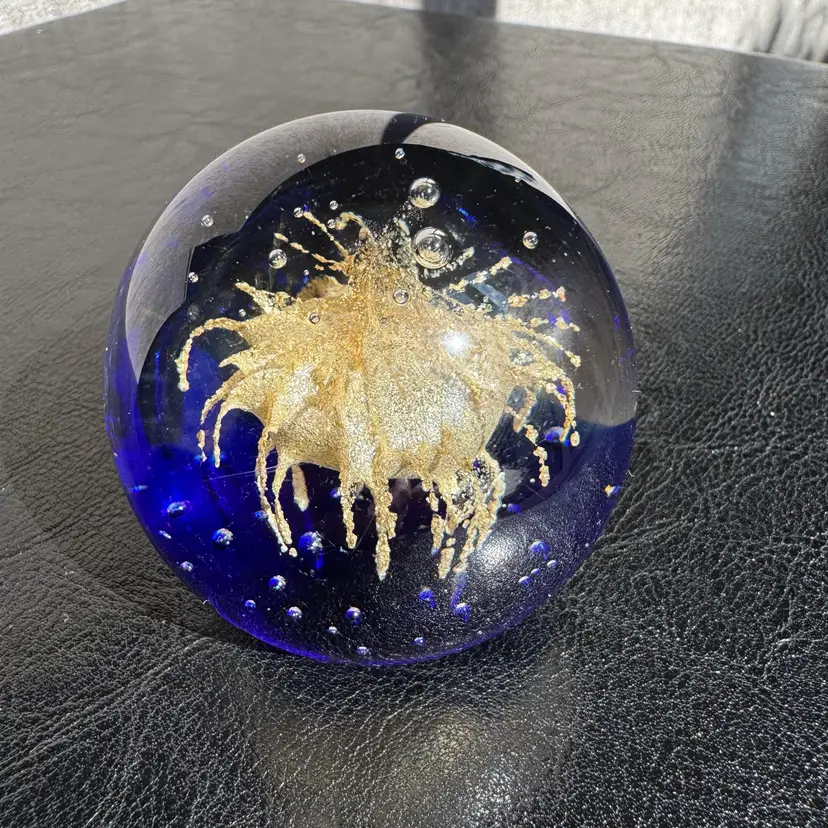 #0067 Cobalt blue art glass paperweight enclosing a gold aventurine sea urchin design.