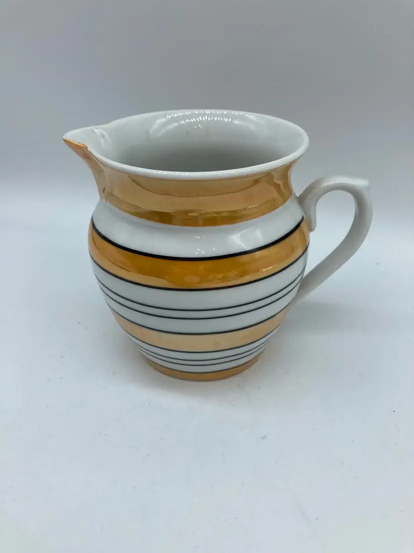 Czechoslovakian pitcher, hand painted in Peach stripes, lusterware iridescent colors from circa 1950’s