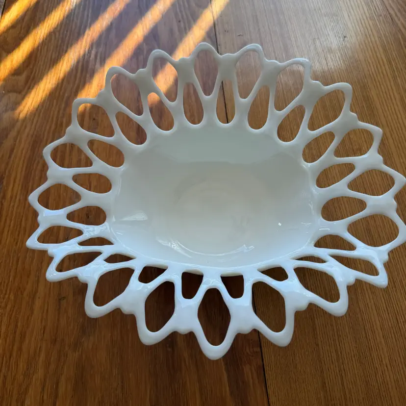 A vintage white milk glass oval lattice bowl by Westmoreland. 12.5x11”