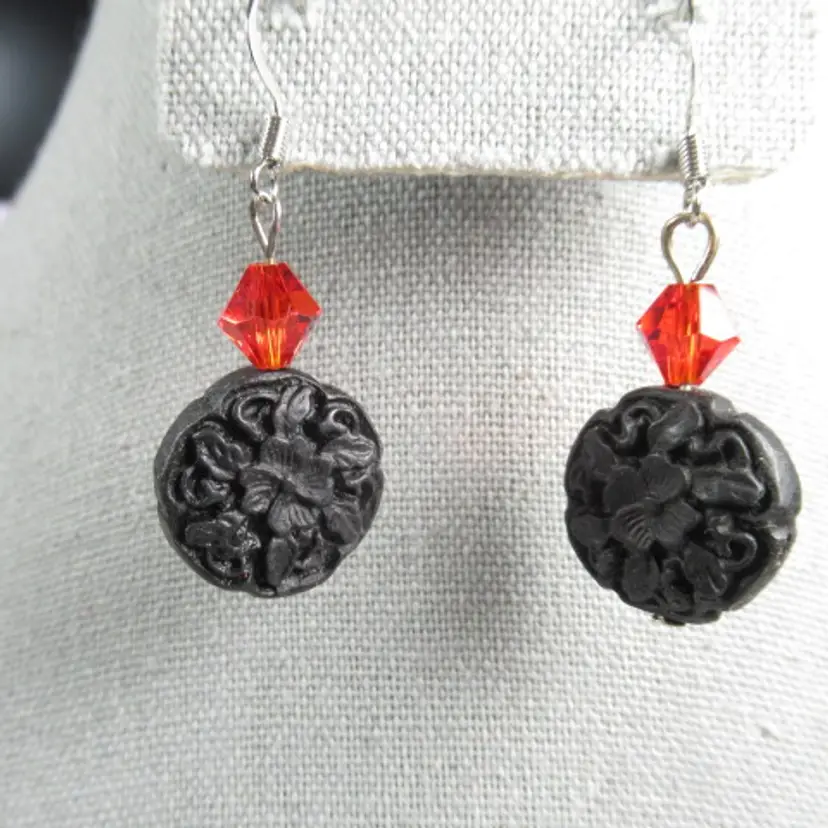 Carved Halloween themed Carved  black bead with orange bicone glass bead  handmade earrings