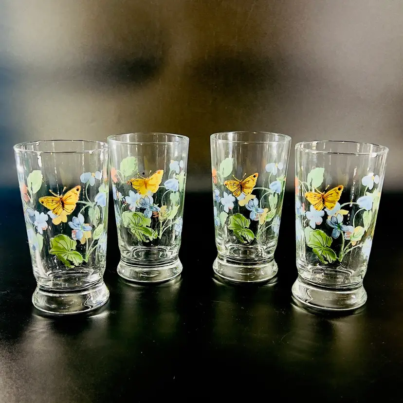 #418- Vintage Juice Glass Footed Beverage 
4pc Set 9 oz  “Vienna Floral” Wildflowers Violets Butterfly Bug