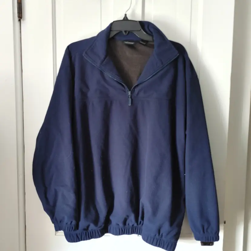 Men's Top- Brand: Greg Norman Collection. Size Large. Navy top. Material: 100% polyester. No condition issues.