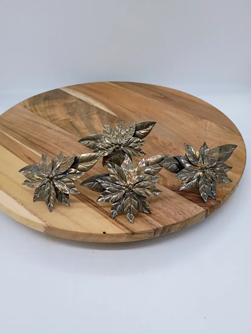 Set of 4  Brass Christmas Poinsettia Napkin Rings.