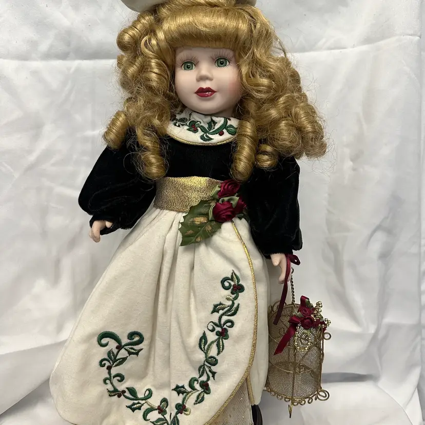 Porcelain Doll Holding A Lantern