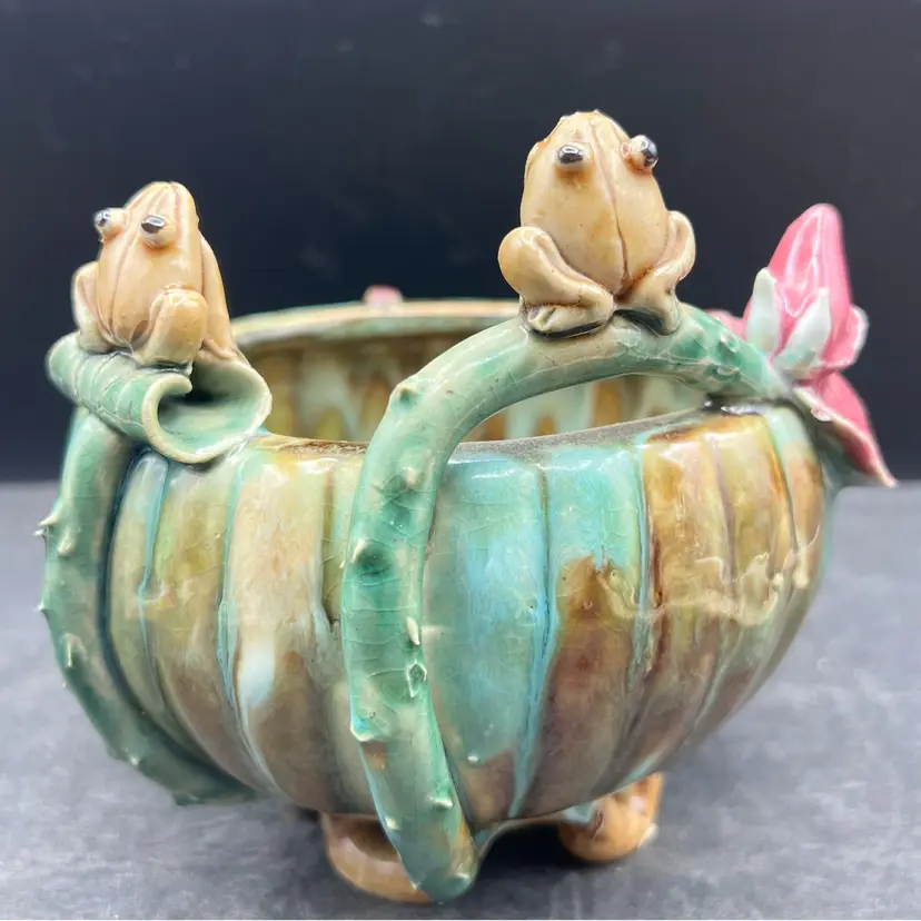 #176B Vintage Hand Made Majolica Frog And Lotus Flower Bowl/Planter. Drip Glaze 
Two Adorable Frogs Sit On The Rim Of The Bowl, One On A Leaf, The Other On A Flower Stem. 
Lots Of Texture On The Piece. Applied Foot