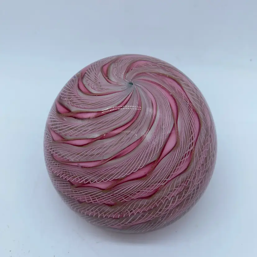 #0023 A mid-20th-century Murano pink lace and aventurine glass paperweight.