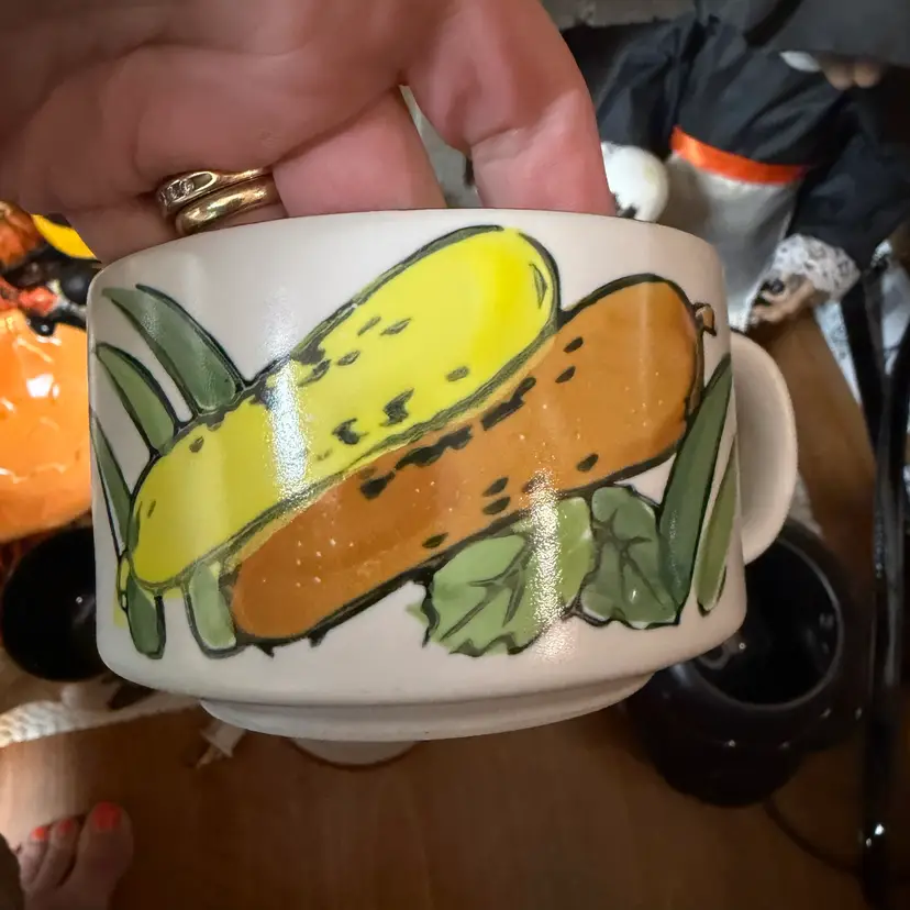 Pair vintage ceramic soup mug featuring a hand-painted yellow and orange vegetable design, reminiscent of 1970s promotional or kitchenware styles