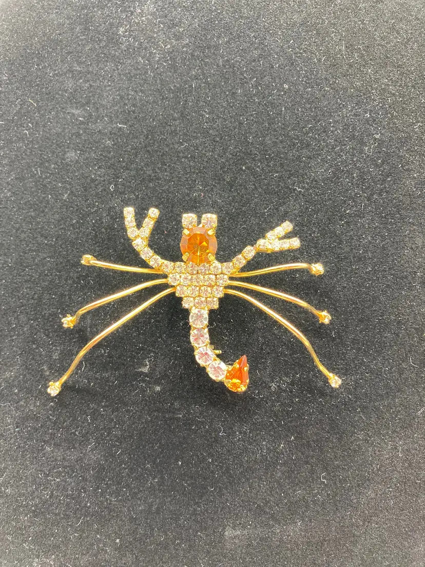 Vintage gold tone rhinestone scorpion designer brooch