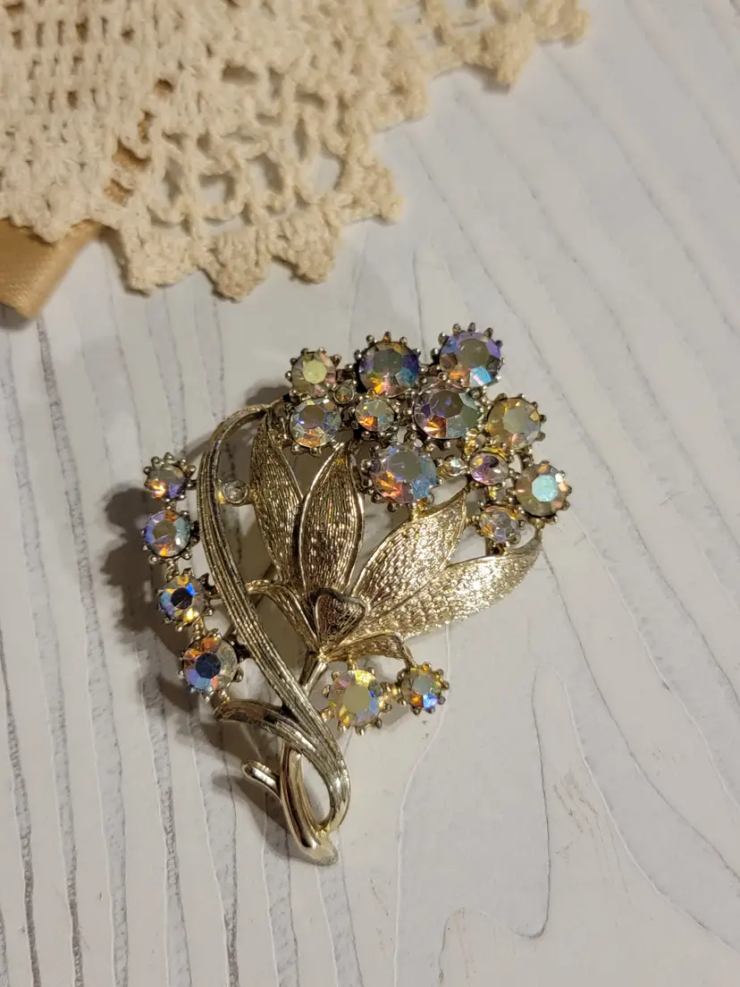 Vintage Coro goldtone and AB crystal rhinestone brooch