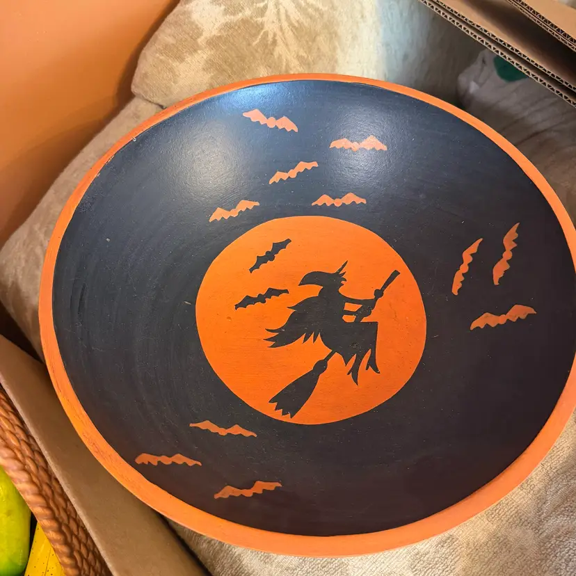 extremely rare Vintage Lindt Wood Halloween Bowl with Witches and Bats, which was originally used as a promotional display piece or a seasonal candy dish.