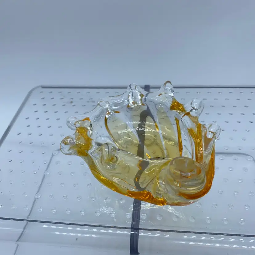#0504 Yellow colored hand-blown art glass seashell-shaped trinket dish.