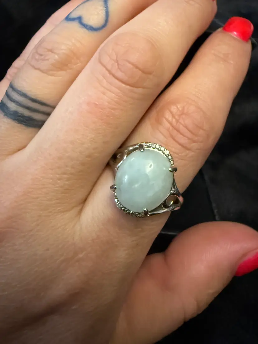 Vintage oval cabochon jadeite stone boasting a highly desirable "icy translucent"