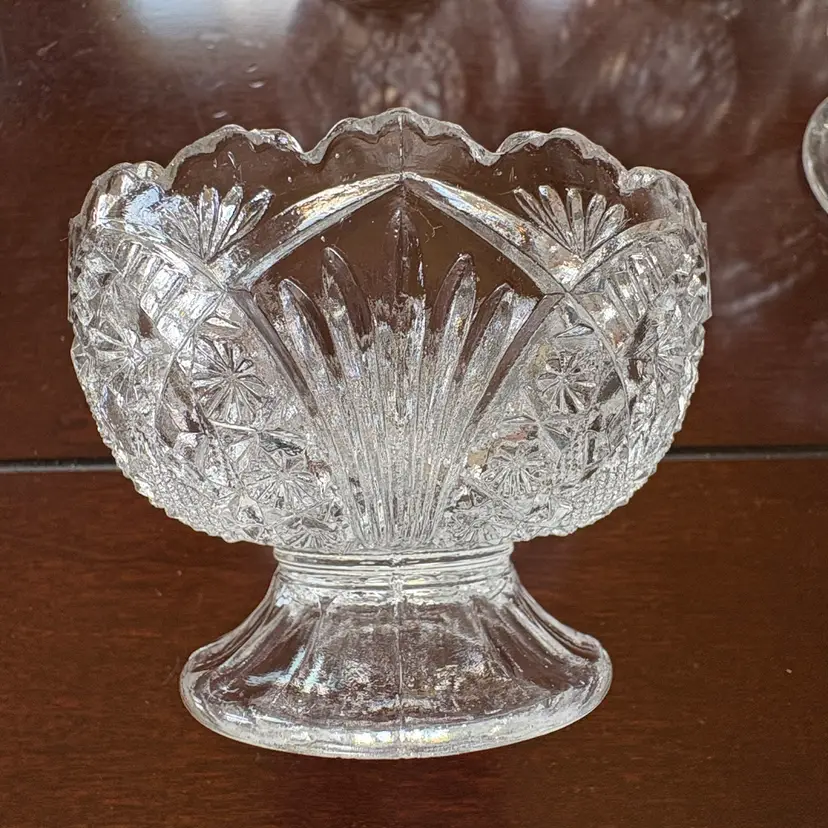 Antique Cambridge Glass Company's No. 2660 "Wheat Sheaf" pattern open salt cellars (or salt dips), introduced in 1908.  They glow green!