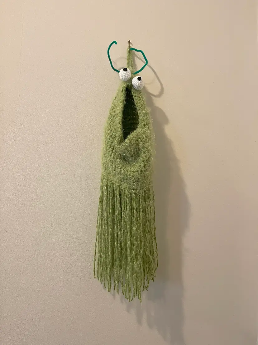 Crocheted Green Monster Bag Holder